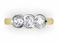 Bezel yellow and white gold trilogy rings MY55 birds eye view